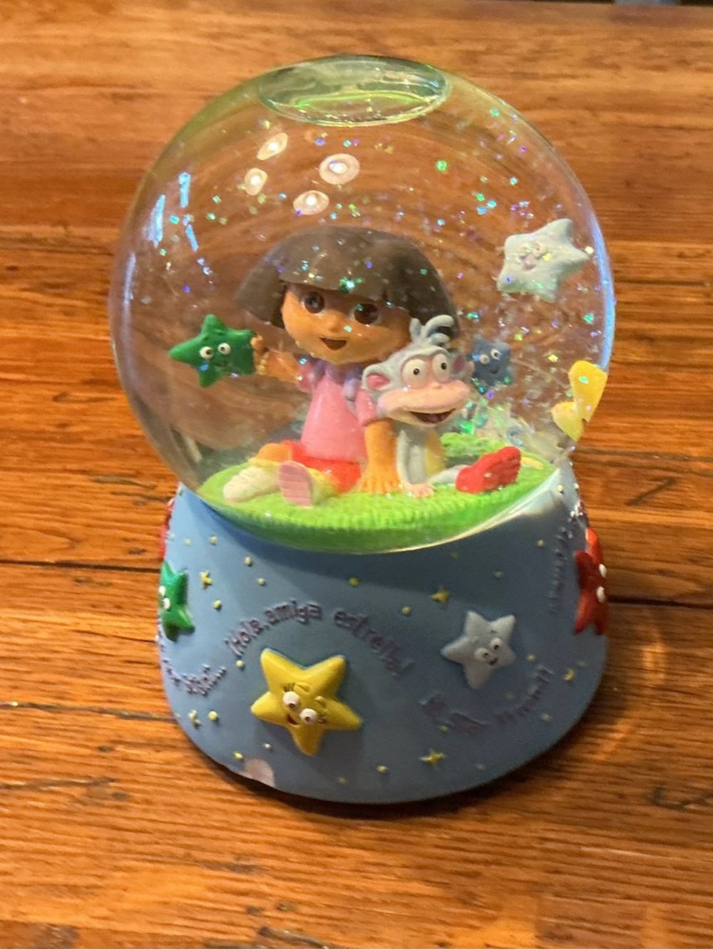 Enesco Dora & Boots Glitter Musical Snow Globe in Blue, Green, Pink